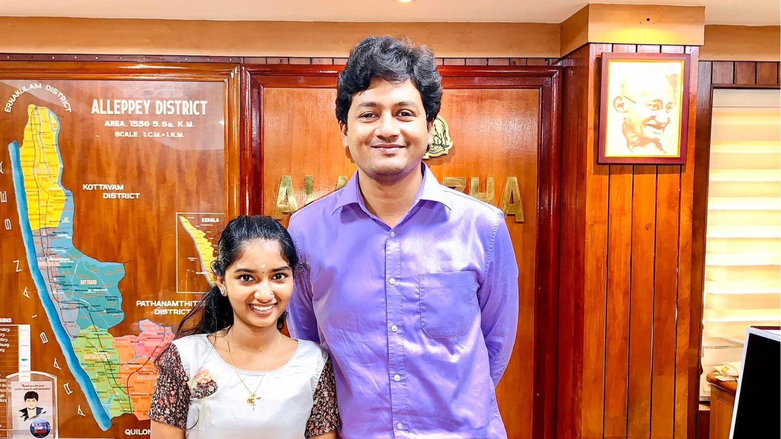 Collector Krishna Teja with the young girl Chippy.