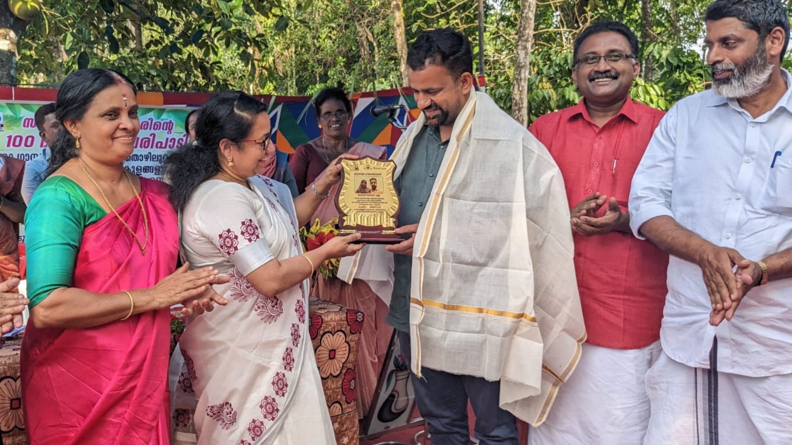 Idukki District Collector Sheeba George felicitating Ajnas P M.