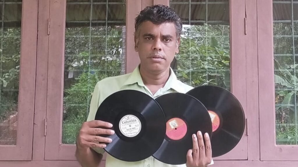 Abdul Ali with his collection of gramophone records at his museum in Malappuram, Kerala.