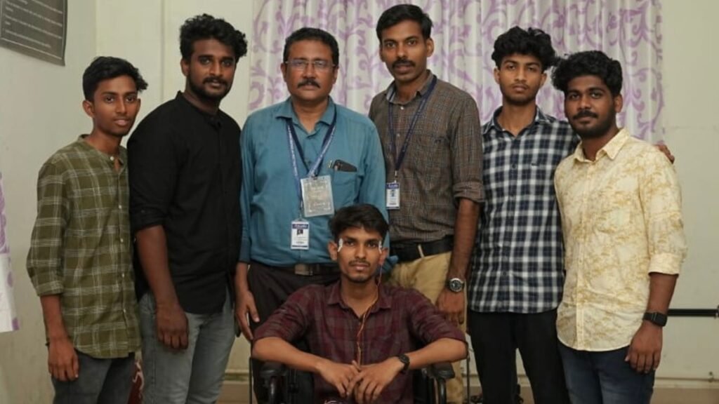 Students of Ilahia College of Engineering and Technology with the prototype wheelchair which they developed.