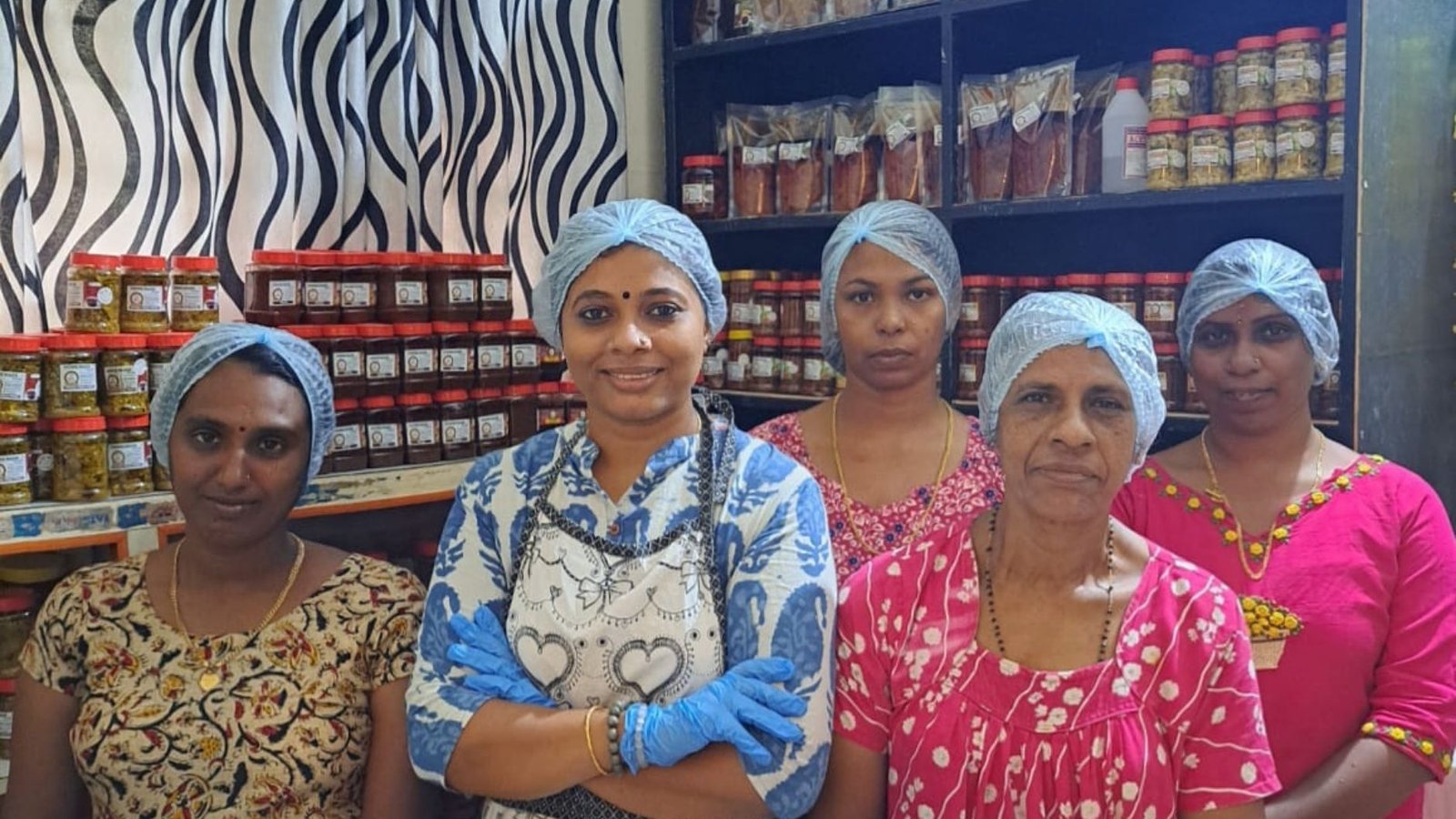 Hincy Salu with her team members at the pickle making unit in Ernakulam.